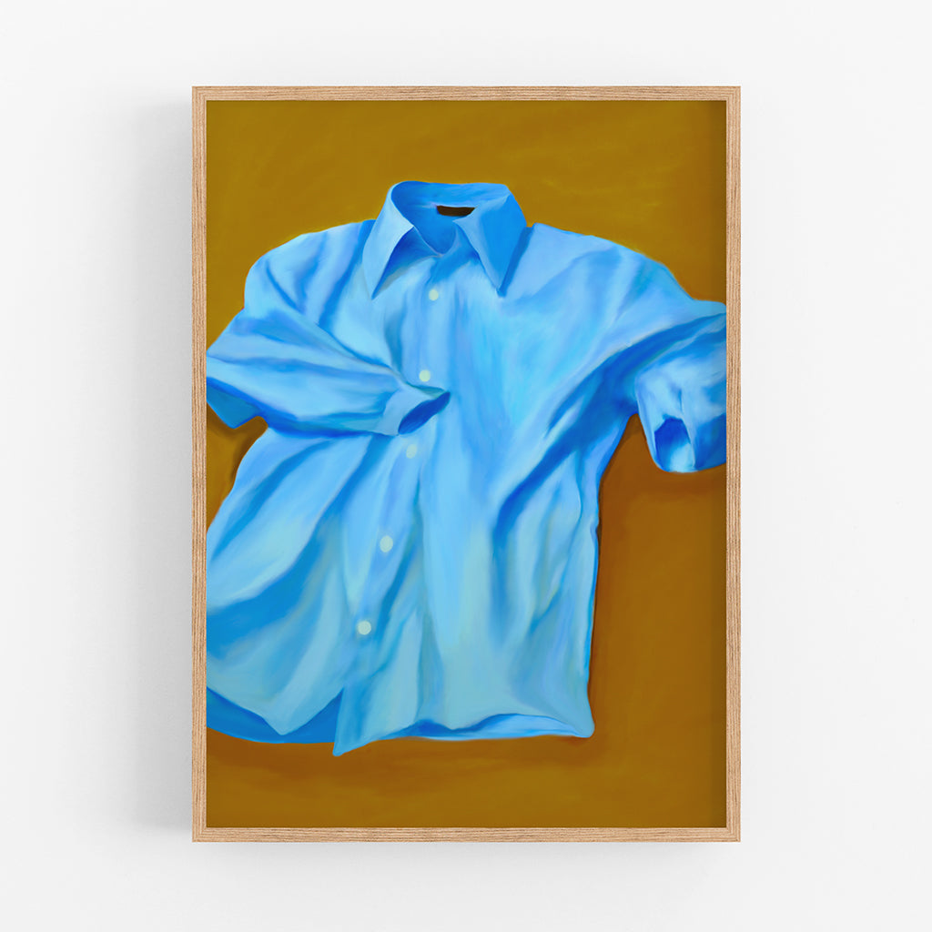 An art print of a blue shirt on a mustard colored background.