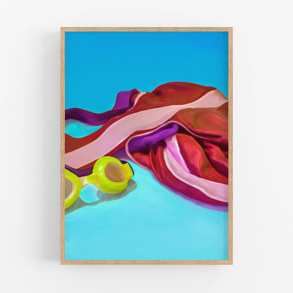 An art print of a red swim suit and swim goggles on a blue background. 